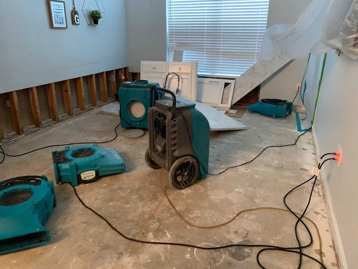 Dehumidifier in flood-cut room for Water Damage Restoration in River Rouge